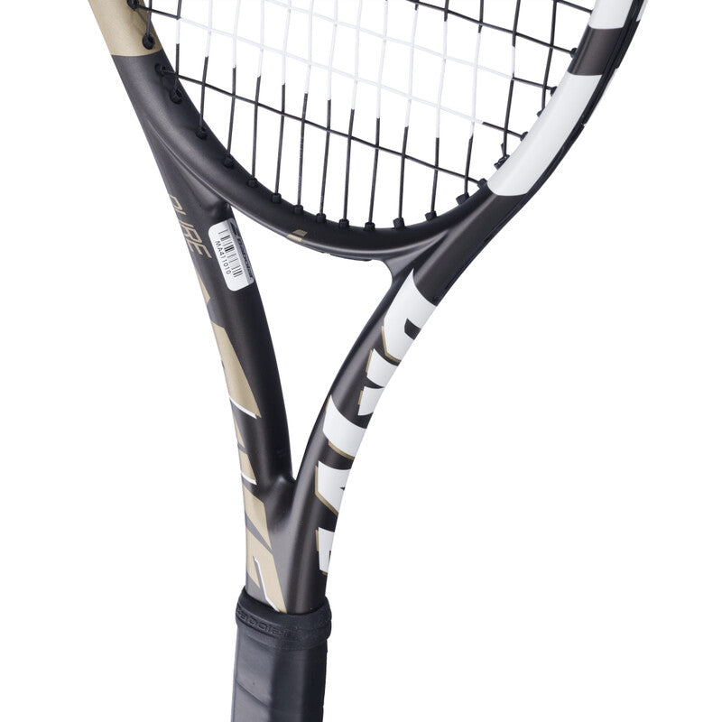 Babolat Pure Drive Wimbledon 100 tennis racquet with blue frame and strings, designed for powerful play on the court.