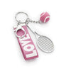 Pink tennis racquet keychain by RACQUET INC featuring a miniature tennis racquet charm on a keyring.